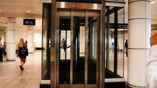 Epic Priceless amp Amazing inground hydraulic glass elevators  Montreal Trudeau Airport YUL [upl. by Lark253]